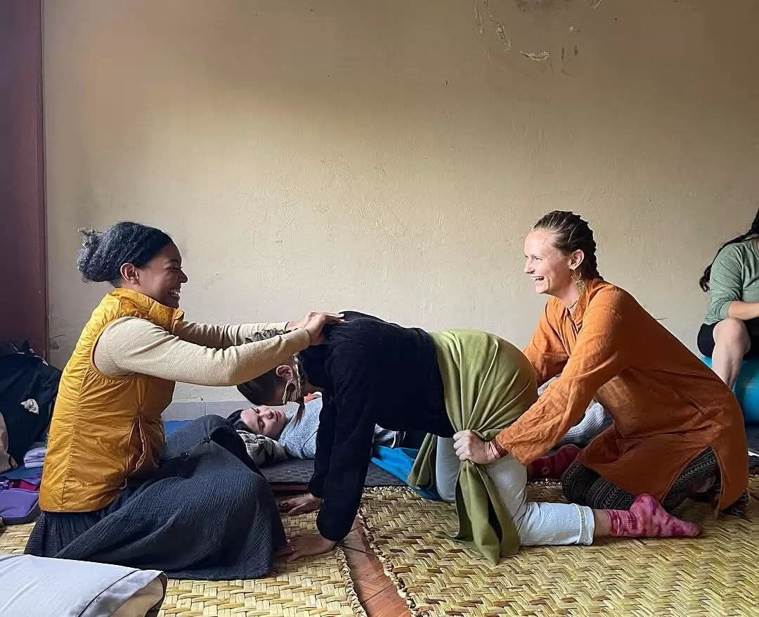 Rebozo work during Closing of the Bones training