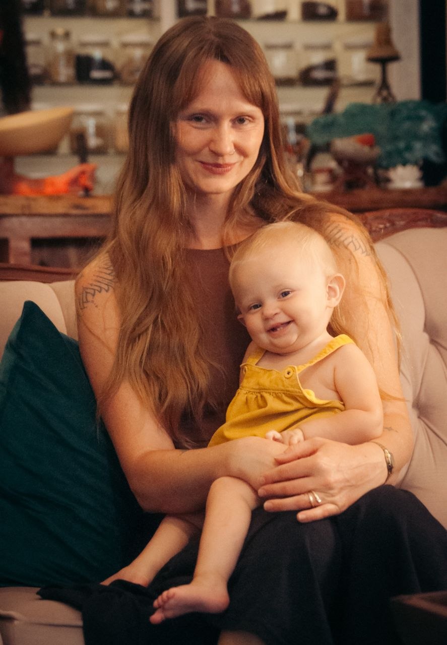 Kelli at home in her apothecary with her daughter